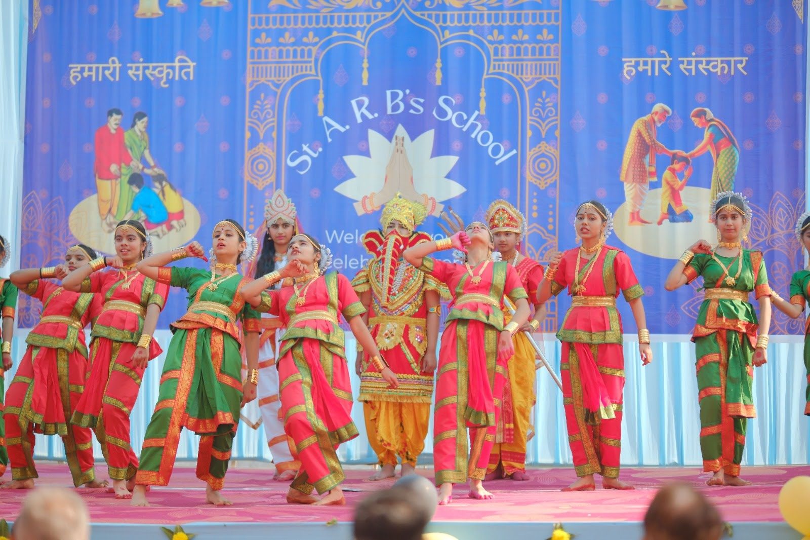 Students performing a classical group dance at the school Annual Function