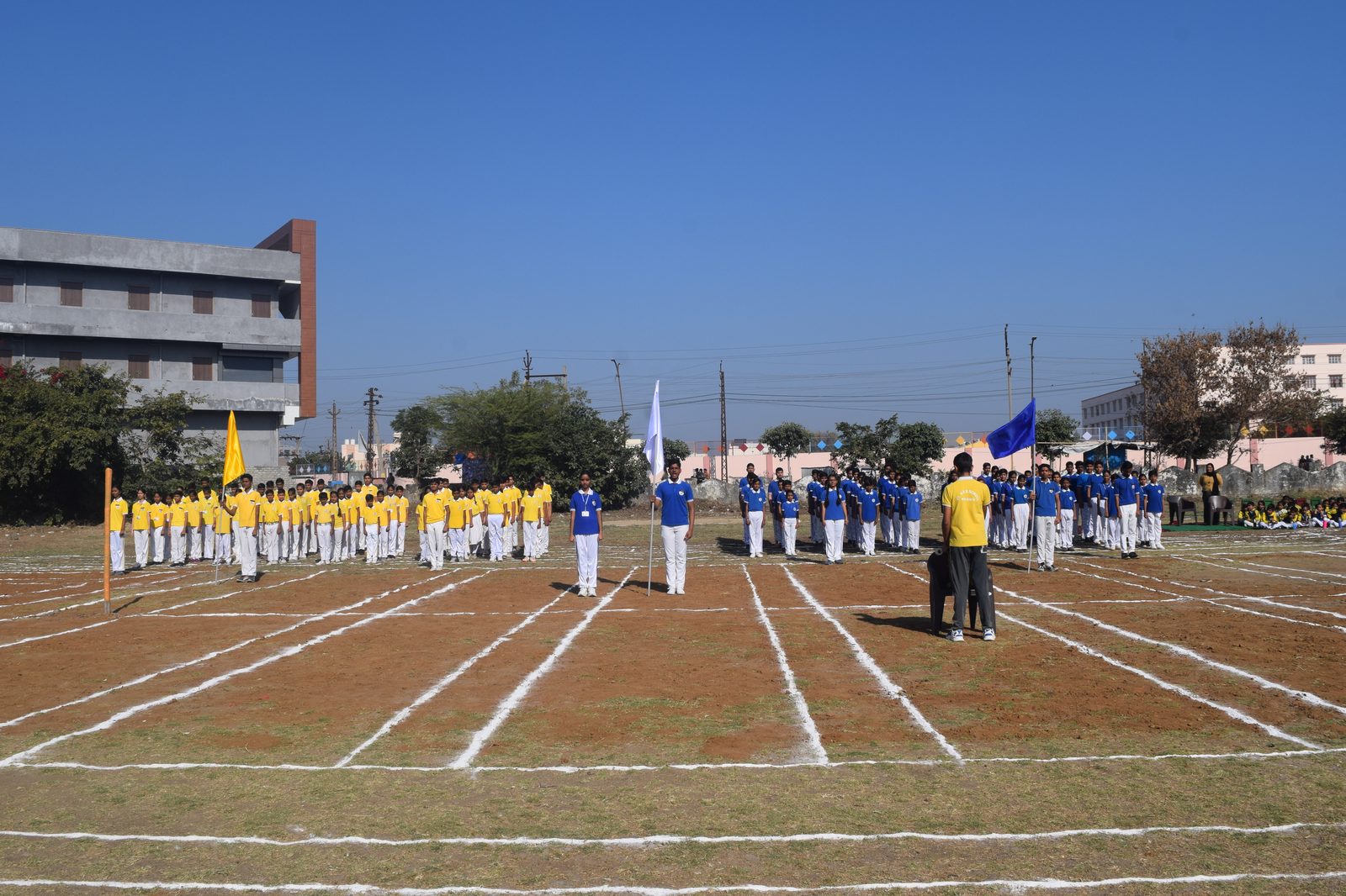 House teams assembled on the school sports ground